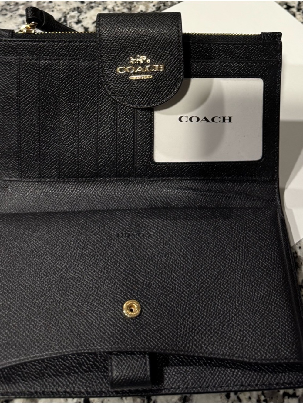 Coach Black Leather Bi-Fold Wallet with Gold Accent